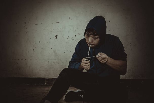 Asian man with drug addicting to injecting heroin into their veins themselves - 写真・画像