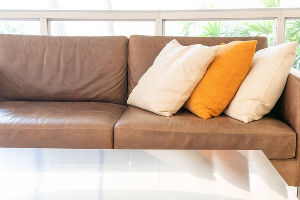 empty sofa and chair with pillows decoration in a room - Foto, Imagem