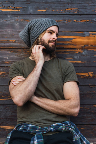 Portrait of bearded young man with blonde hair and fit - Photo, Image