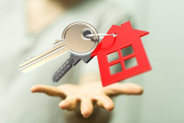Uma pessoa apresentando a projeção virtual de chaves e uma casa
 - Foto, Imagem