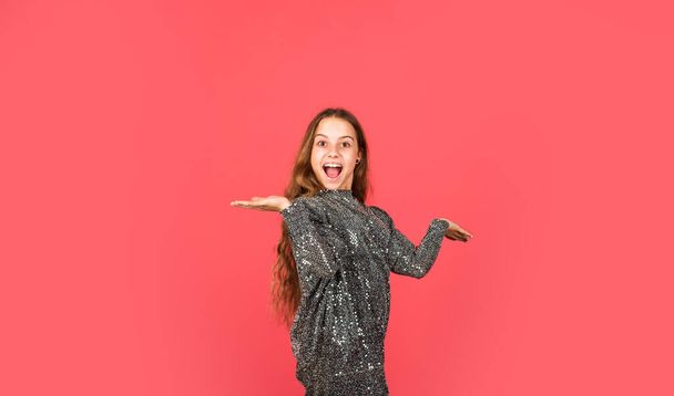 Party is on. Party girl red background. Happy child with party look. Fashion and beauty. Holiday celebration. Enjoying birthday party, copy space - Fotó, kép