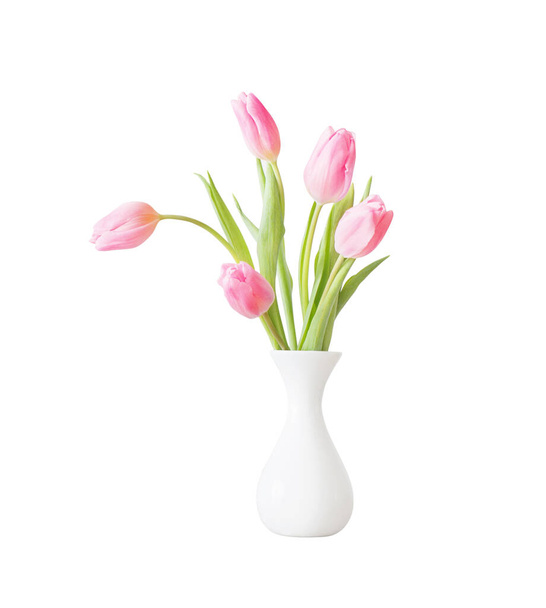 pink tulips in white ceramic vase isolated on white background  - 写真・画像