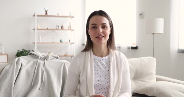 Millennial woman fashion blogger recording vlog at home - Materiaali, video