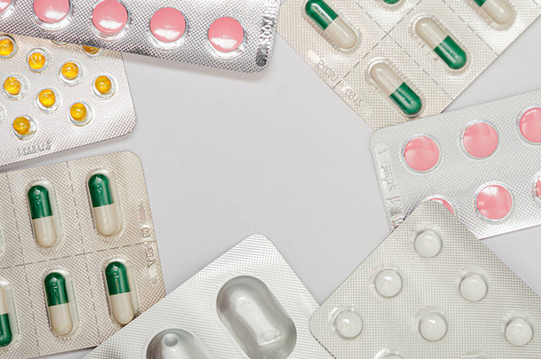 Medicines (pills) on the background. Medical background. Health protection during a pandemic, epidemic, coronovirus. - Fotografie, Obrázek