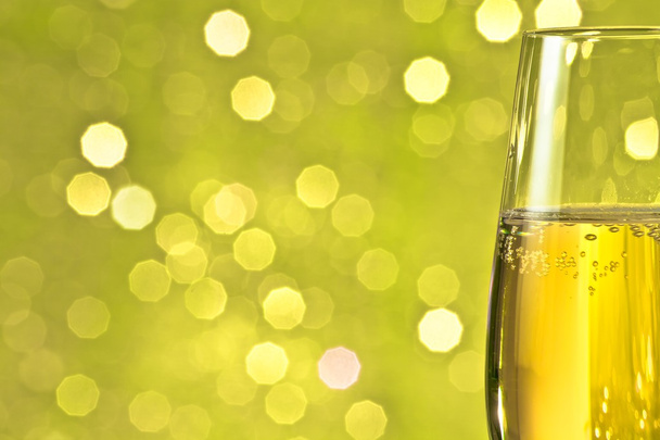 one flute of champagne on abstract background - Foto, imagen