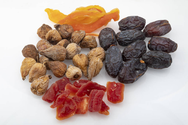 scrambled with dried fruits on a white background - Photo, Image