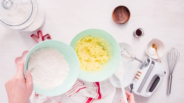 Flat lay. Step by step. Mixing sugar cookies dough in mixing bowl. - Photo, Image