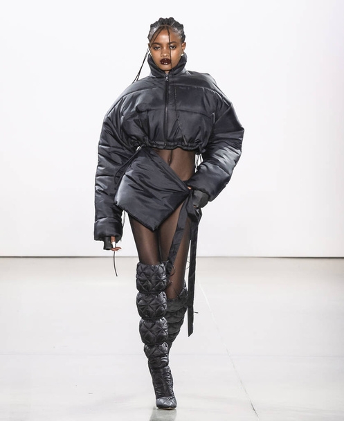New York, New York - Feb. 08, 2020: Elizabeth Ayodele walks the runway at LaQuan Smith Fall Winter 2020 Fashion Show - Zdjęcie, obraz