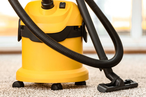 Modern vacuum cleaner in room - Photo, Image