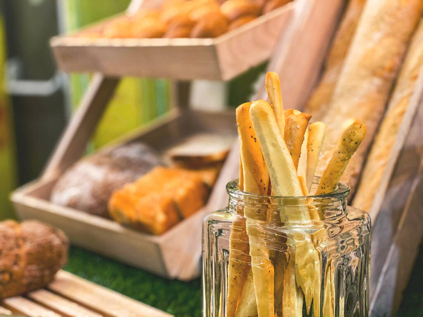 Fresh bread sticks close-up. Healthy and delicious snack - Foto, afbeelding