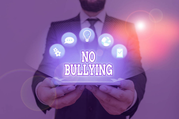 Escritura manual conceptual que muestra No Bullying. Texto de la foto de negocios detener el comportamiento agresivo entre los niños desequilibrio de poder
. - Foto, Imagen