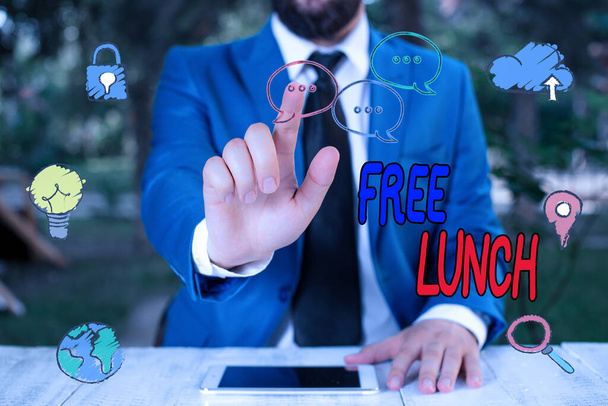 Handschrift tekst schrijven Gratis Lunch. Concept betekent iets dat je gratis krijgt en waar je meestal voor moet werken of betalen. - Foto, afbeelding