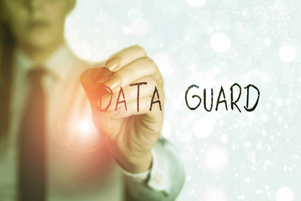 Tekst schrijven Data Guard. Bedrijfsconcept voor het beheren van databases om rampen en gegevenscorrupties te overleven. - Foto, afbeelding