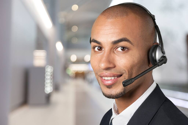 portrait of a smiling customer service representative with headset - Φωτογραφία, εικόνα