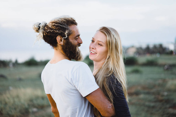 Smiling couple in love outdoors. - Photo, Image