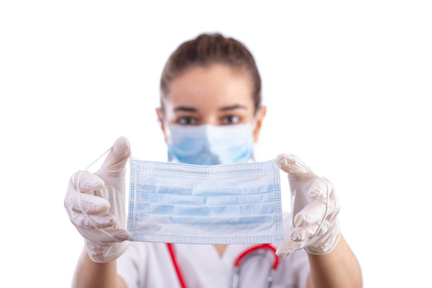 Female doctor with face mask - Foto, Bild