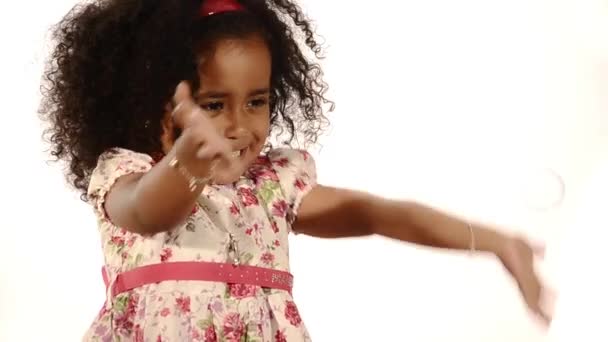 Mixed race brazilian child and soap bubbles - Materiał filmowy, wideo