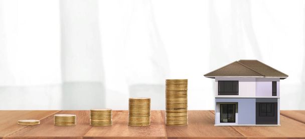 Модель дома и монеты. Концепция жилья и недвижимости. главная идея бизнеса
 - Фото, изображение