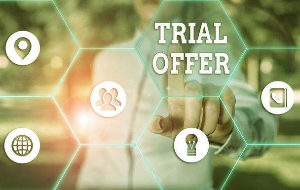 Conceptual hand writing showing Trial Offer. Business photo showcasing A temporary free or discounted offer of a product or services. - Photo, Image