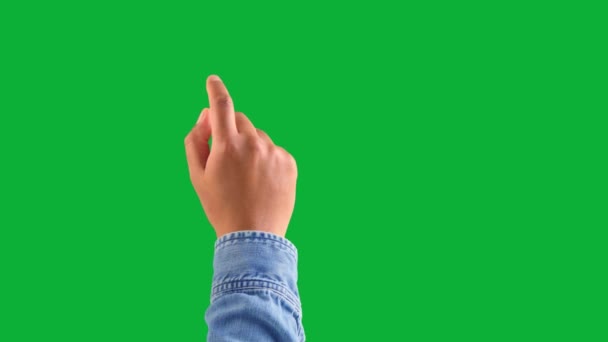 mixed race deep skin male hand makes a swipe to the right with one index finger forefinger gesture on on chromakey green - Footage, Video