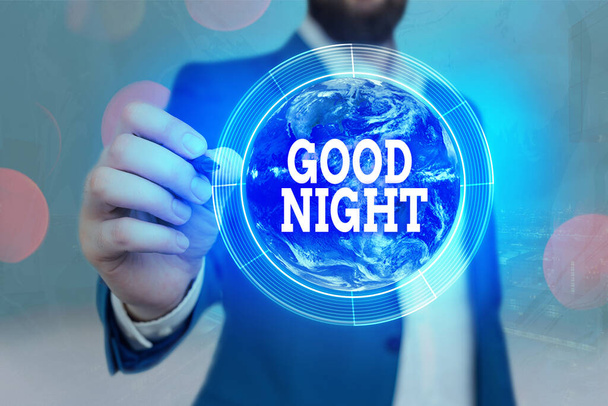 Κείμενο συγγραφής καληνύχτα. Έννοια που σημαίνει εκφράζοντας τις καλές ευχές για το χωρισμό τη νύχτα ή πριν πάτε στο κρεβάτι Στοιχεία αυτής της εικόνας που παρέχονται από τη NASA. - Φωτογραφία, εικόνα