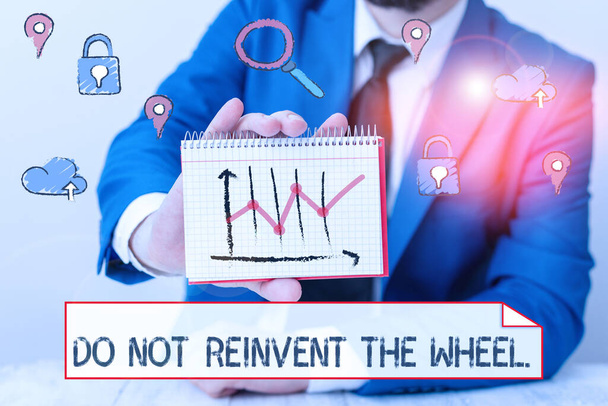 Writing note showing Do Not Reinvent The Wheel. Business photo showcasing stop duplicating a basic method previously done. - Photo, Image