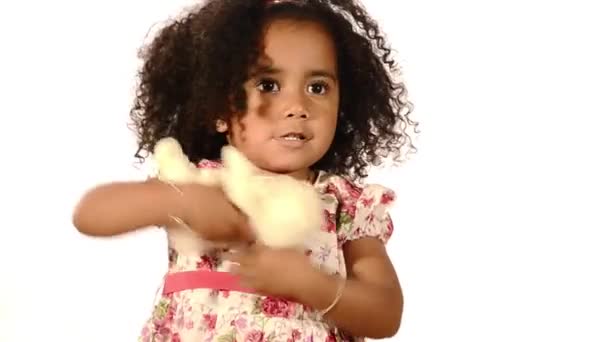 Mixed race brazilian child with her soft toy - Πλάνα, βίντεο