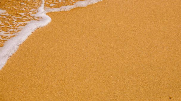 Kumlu sahil şeridi dokusu arkaplanının bir görüntüsü - Fotoğraf, Görsel