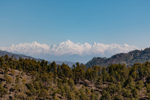 Snow covered mountains scenic view with layers of mountains at uttrakhand - Photo, image