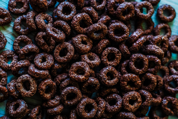 pattern of chocolate cereal rings for breakfast - Photo, Image