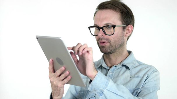 Casual Man Browsing Interne on Tablet, White Background - Foto, immagini