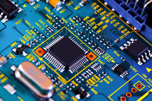 Electronic circuit board with electronic components such as chips close up - Фото, изображение
