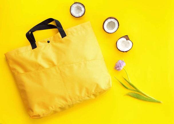 shopping bag with products on the yellow background, delivery, takeaway - Фото, изображение