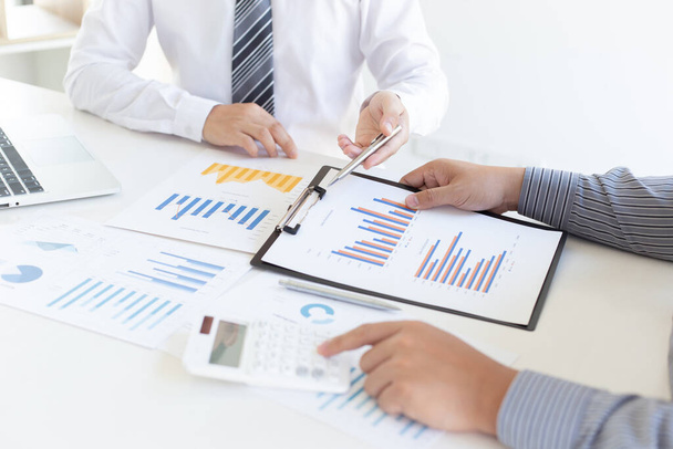 Business team meeting analyze financial graphs market growth reports And corporate income tax, Analysis of financial accounting and real estate investment concept - Photo, Image