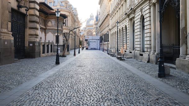 Bucharest, Romania - March 19, 2020: Empty old city center after bars and restaurants closed down in order to mitigate the spread of the Coronavirus (COVID-19) outbreak. - Fotó, kép