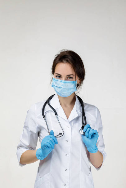 woman doc in white lab coat and stethoscope - 写真・画像