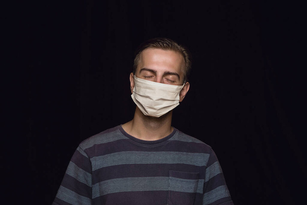 Man in protective mask, coronavirus prevention, protection concept - Foto, Imagem