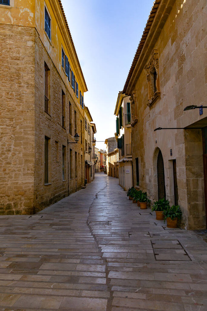 Historic old town of Alcudia, idyllic narrow streets, Mallorca Spain - 写真・画像