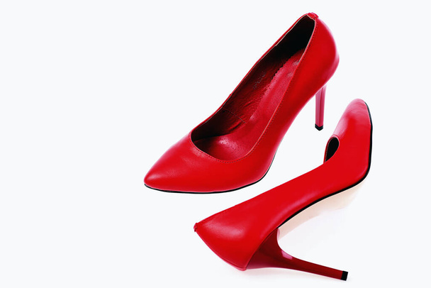 Female formal footwear in red colour, closeup - 写真・画像