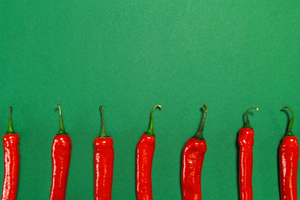 Creative chilli pepper background for posters, blogs, web design. Selective focus. Healthy food ingredient suitable for vegans and vegetarians - Foto, Imagem