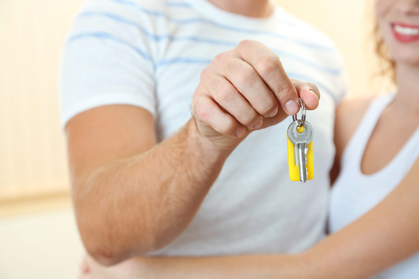 Young couple with keys to your new home close-up - Fotografie, Obrázek