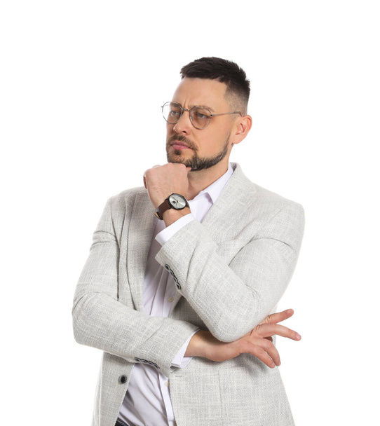 Confident businessman in glasses on white background - Valokuva, kuva