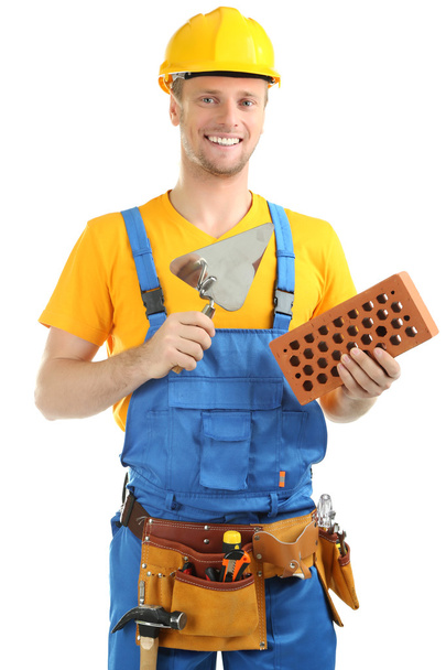 Portrait of young builder isolated on white - Fotografie, Obrázek