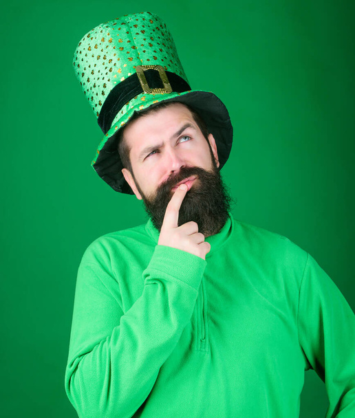 Happy patricks day. St patricks day holiday known for parades shamrocks and all things Irish. Global celebration. Man bearded hipster wear hat. Saint patricks day holiday. Green part of celebration - Photo, Image
