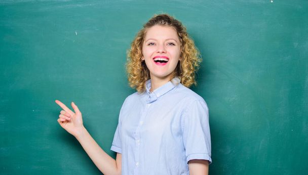 Teacher best friend of learners. Good teacher is master of simplification. Passionate about knowledge. Teaching could be more fun. Woman teacher in front of chalkboard. Teacher explain hard topic - Photo, Image