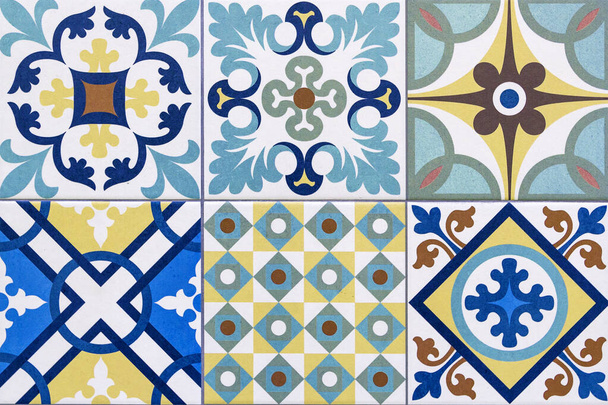 Detail of traditional tiles from the facade of an old house in Porto, Portugal. Traditional Portugal pottery. Seamless pattern with Portuguese tiles. Multicolor design. Azulejo. - Photo, Image