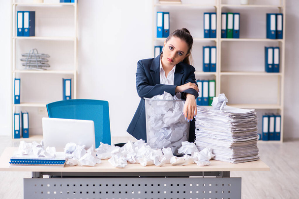 Businesswoman rejecting new ideas with lots of papers - Photo, image