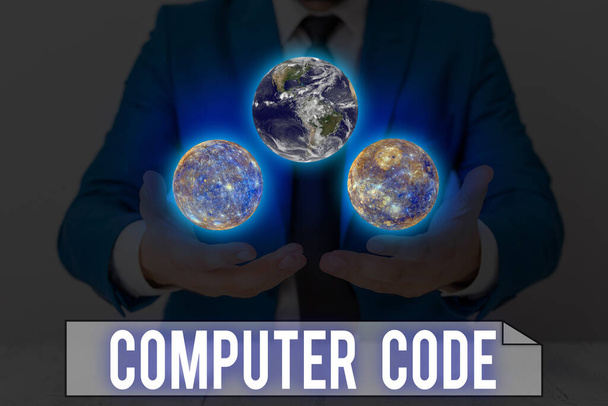 Word writing text Computer Code. Geschäftskonzept für eine Reihe von Instruktionen, die ein Computerprogramm bilden, um Elemente dieses Bildes auszuführen, das von der NASA geliefert wurde. - Foto, Bild