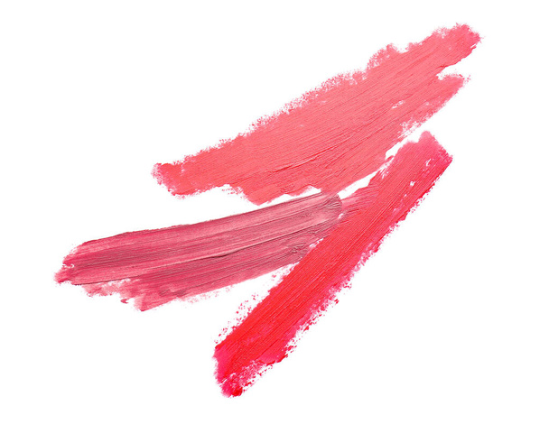 Strokes of bright lipsticks on white background - Photo, Image