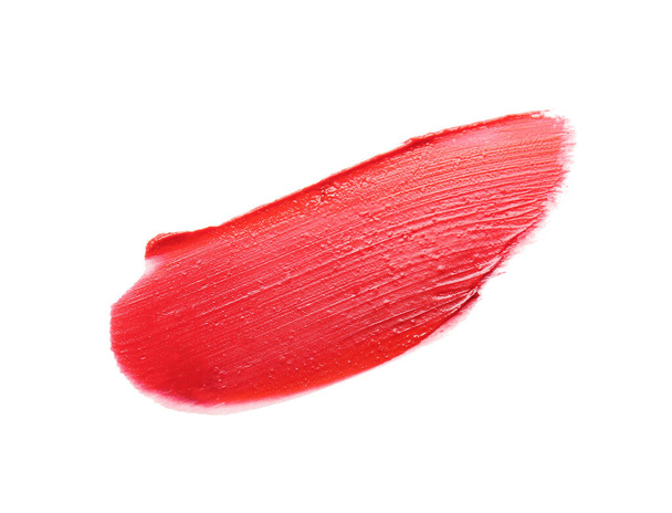 Sample of bright lipstick on white background - Foto, Bild